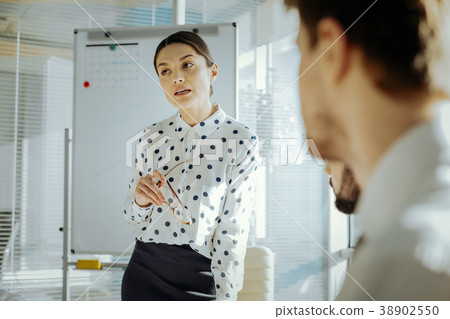 Charming young woman expressing her opinion during Charming young woman expressing her opinion during 38902550