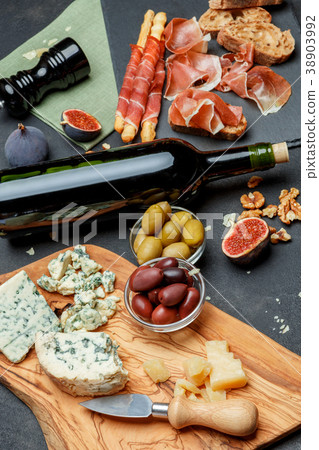 Traditional italian food - prosciutto, cheese 38903992