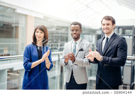multiracial business team applauding themselves 38904144