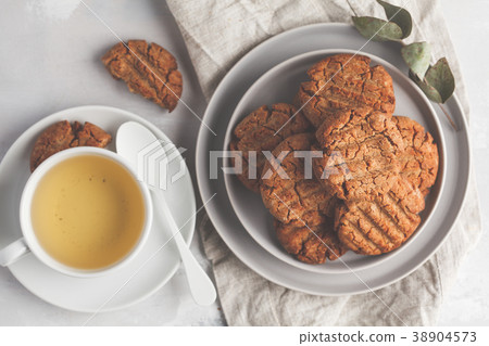 Homemade healthy aquafaba vegan cookies with tea Homemade healthy aquafaba vegan cookies with tea 38904573