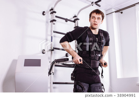 EMS male working out, doing push ups. man doing EMS male working out, doing push ups. man doing 38904991