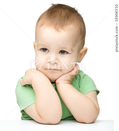 Portrait of a cute and pensive little boy 38906550