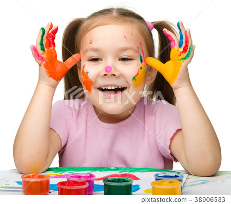 Cheerful girl with painted hands Cheerful girl with painted hands 38906583
