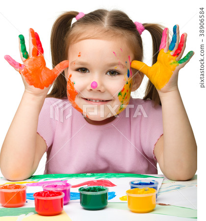 Cute cheerful girl with painted hands 38906584
