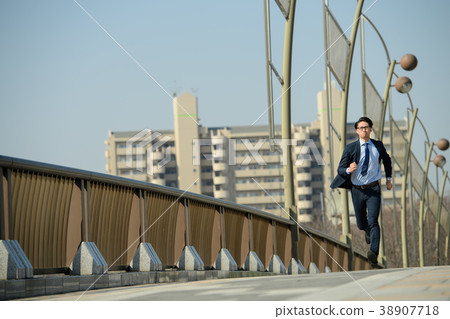Businessman run blue sky business image Businessman run blue sky business image 38907718