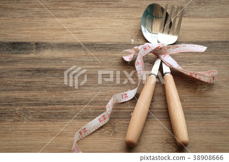 Fork and spoon on wooden Fork and spoon on wooden 38908666