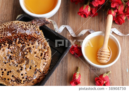 Sweet honeycomb and honey Sweet honeycomb and honey 38908730