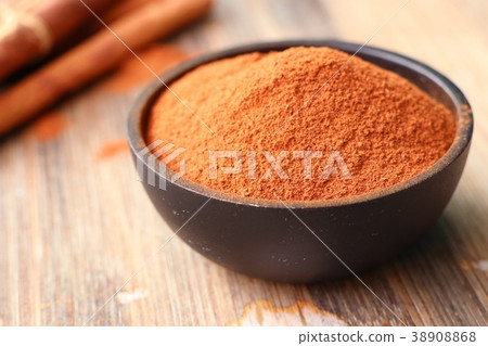 Cinnamon powder and stick 38908868