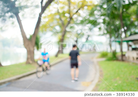 Blur people exercise at park nature bakground Blur people exercise at park nature bakground 38914330