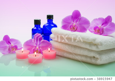 Candle and orchid flower aroma 38915947