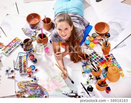 Authentic artist children girl paints on floor Authentic artist children girl paints on floor 38918183