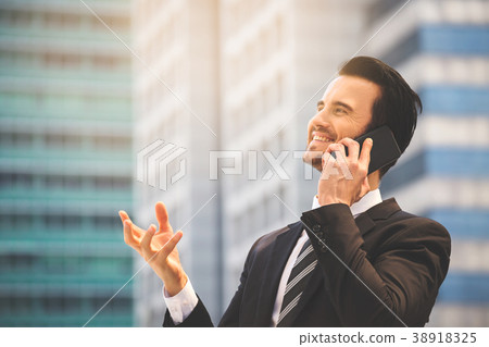 businessman speaking on smart phone 38918325