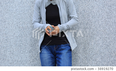 closeup of female hands counting money on city 38919270