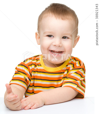 Portrait of a cute cheerful little boy 38921343