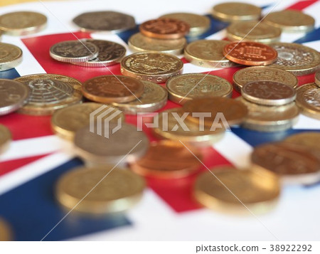 Pound coins, United Kingdom over flag 38922292