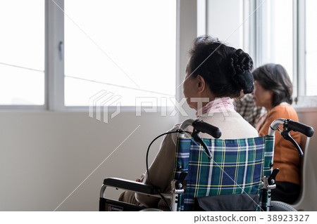 Senior image Women riding a wheelchair 38923327