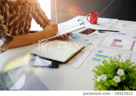 Business people working with new startup project  38923823