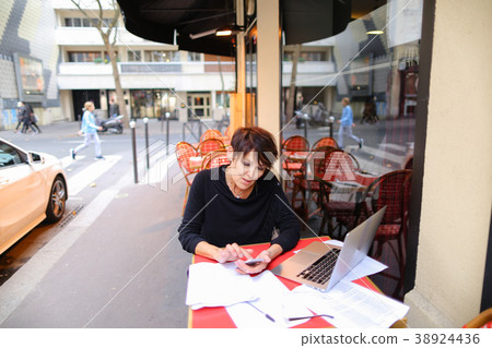 aged female teacher working in open air with 38924436