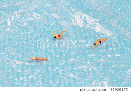 Figurines Swimming In the Water back ground 38926175