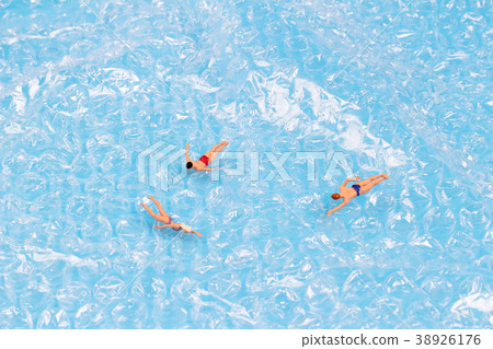 Figurines Swimming In the Water back ground 38926176