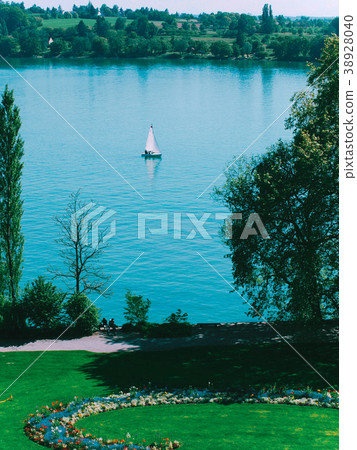 Mainau island sailboat at lake Bodensee, Germany. Mainau island sailboat at lake Bodensee, Germany. 38928040