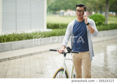 Asian cyclist 38928325