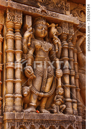 Carved idol on the outer wall, Hatkeshwar Mahadev Carved idol on the outer wall, Hatkeshwar Mahadev 38928454