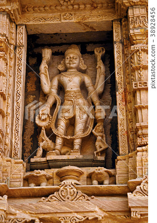 Carved idol on the outer wall, Hatkeshwar Mahadev Carved idol on the outer wall, Hatkeshwar Mahadev 38928456