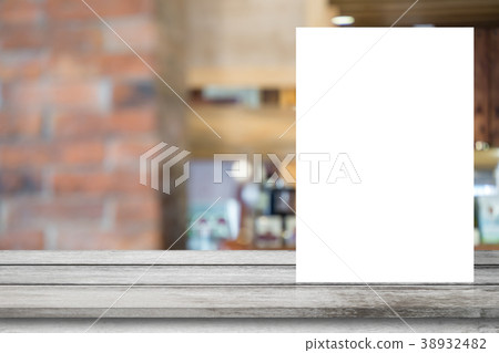 White mockup poster on top of wood table 38932482