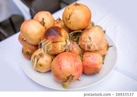 Pomegranate on white background 38933537