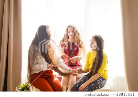 Girlfriends lying on the floor Girlfriends lying on the floor 38933551