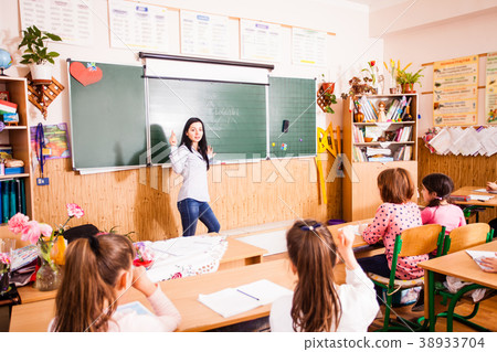 Schoolchildren in the classroom 38933704