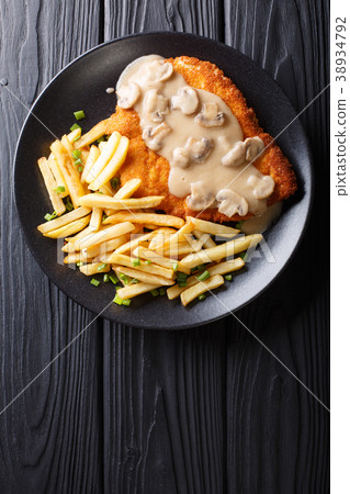 delicious Wiener Hunter schnitzel with sauce delicious Wiener Hunter schnitzel with sauce 38934792