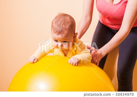 Baby exercises on fitball Baby exercises on fitball 38934970