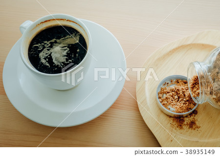 Cup of hot coffee amaricano on the surface placed  38935149