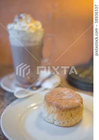 Scone with Hot chocolate in the cafe Scone with Hot chocolate in the cafe 38936337