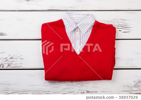 Female red sweater with white collar. Female red sweater with white collar. 38937029