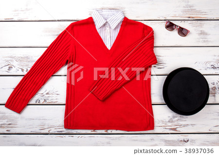 Female fashion sweater and accessories. 38937036