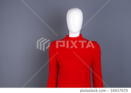 Mannequin in red fashion turtleneck sweater. 38937670