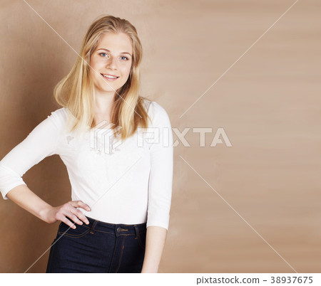 young pretty happy smiling blonde woman close up young pretty happy smiling blonde woman close up 38937675