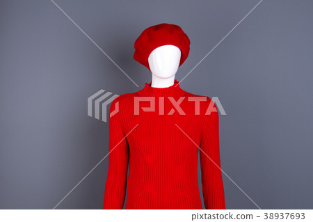 Mannequin in red beret and sweater. Mannequin in red beret and sweater. 38937693