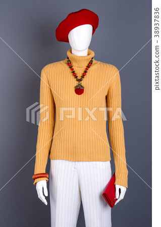 Red beret and accessories on mannequin. Red beret and accessories on mannequin. 38937836