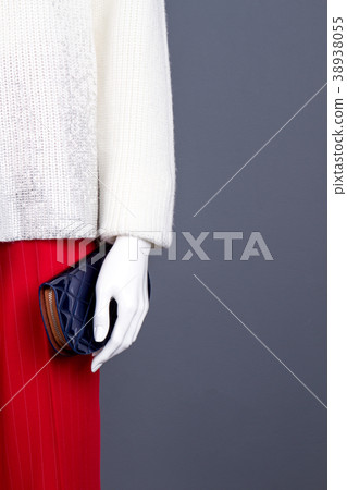 Female mannequin with wallet, copy space. 38938055