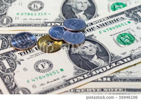 One dollar bill and 108 yen 38946106
