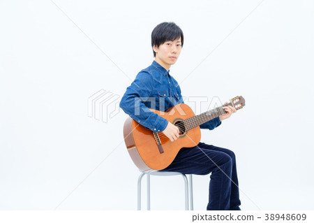 Men with classical guitar 38948609