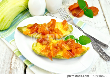 Courgettes in spicy sauce with dried apricots 38948829