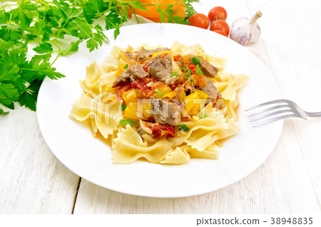 Farfalle with turkey and vegetables in sauce Farfalle with turkey and vegetables in sauce 38948835