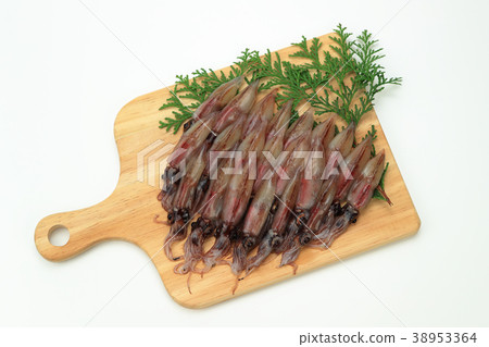 Raw firefly squid on a cutting board 38953364
