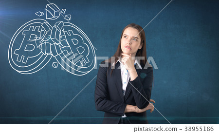 Successful business woman standing near btc logo 38955186