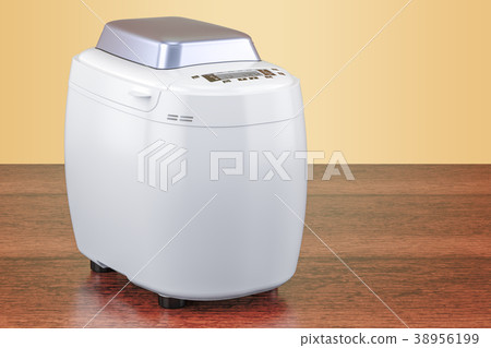 White bread making machine on the wooden table 38956199